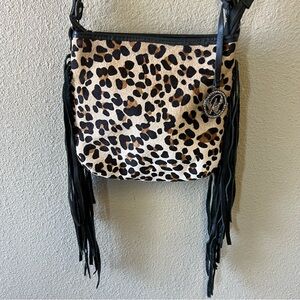 RAVIANI leopard print hair on calf fringed soft leather crossbody bag.